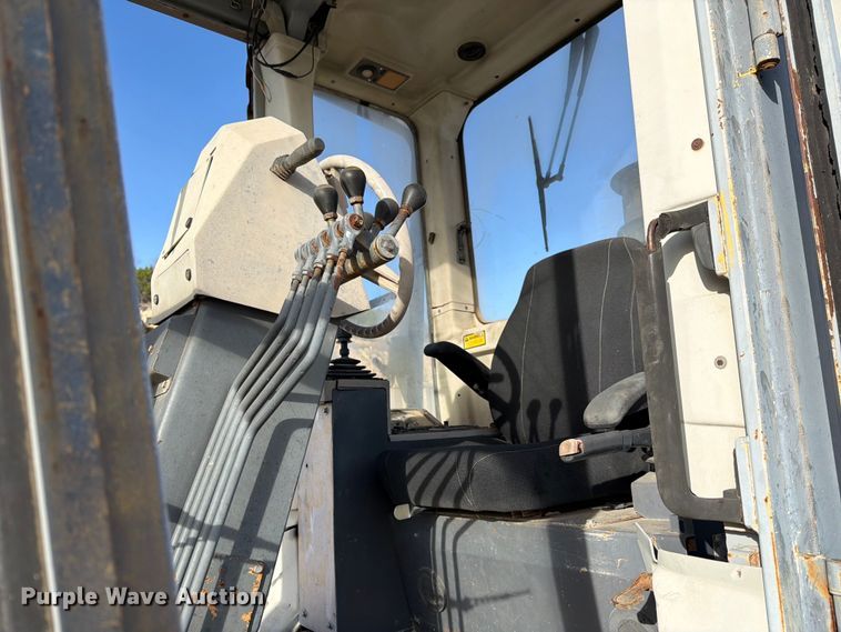 image for item ED5179 2000 New Holland RG170 motor grader