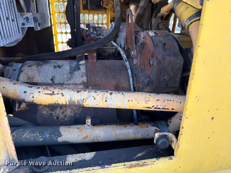 image for item ED5179 2000 New Holland RG170 motor grader