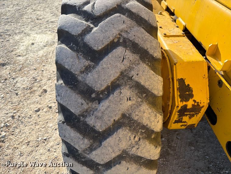 image for item ED5179 2000 New Holland RG170 motor grader