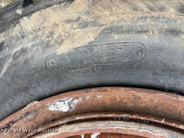 image for item EJ7809 (4) 17.5R25 tires and wheels