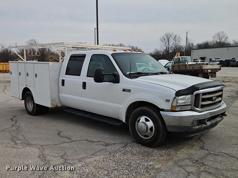 image for item EO7160 2002 Ford F350 Crew Cab utility bed pickup truck