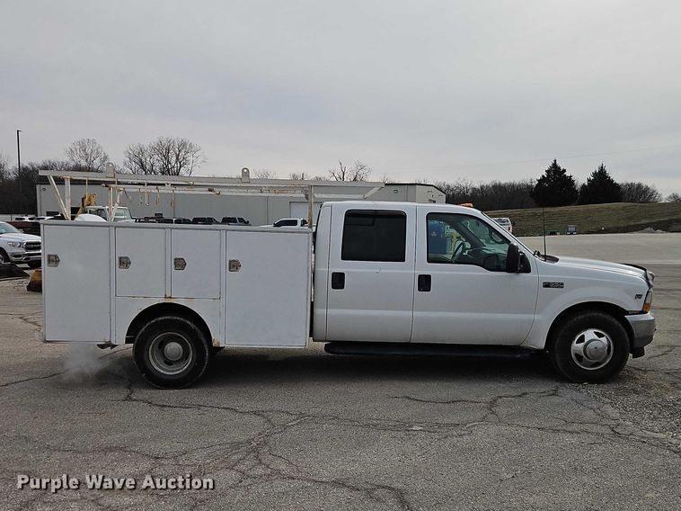 image for item EO7160 2002 Ford F350 Crew Cab utility bed pickup truck