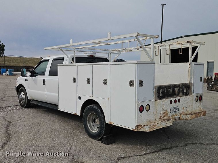 image for item EO7160 2002 Ford F350 Crew Cab utility bed pickup truck