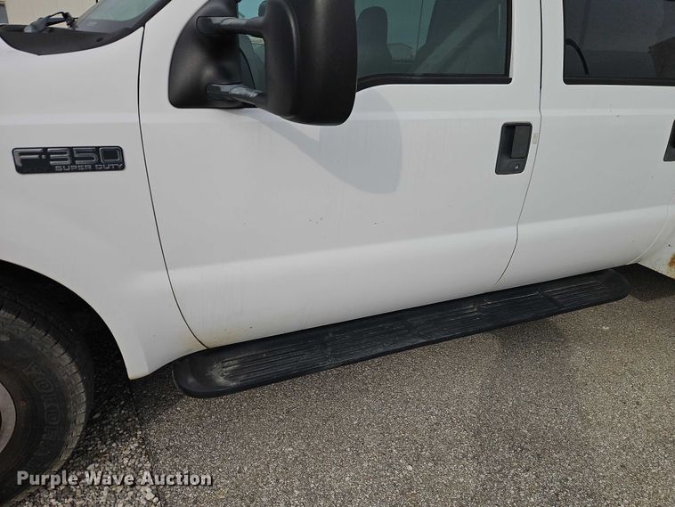 image for item EO7160 2002 Ford F350 Crew Cab utility bed pickup truck