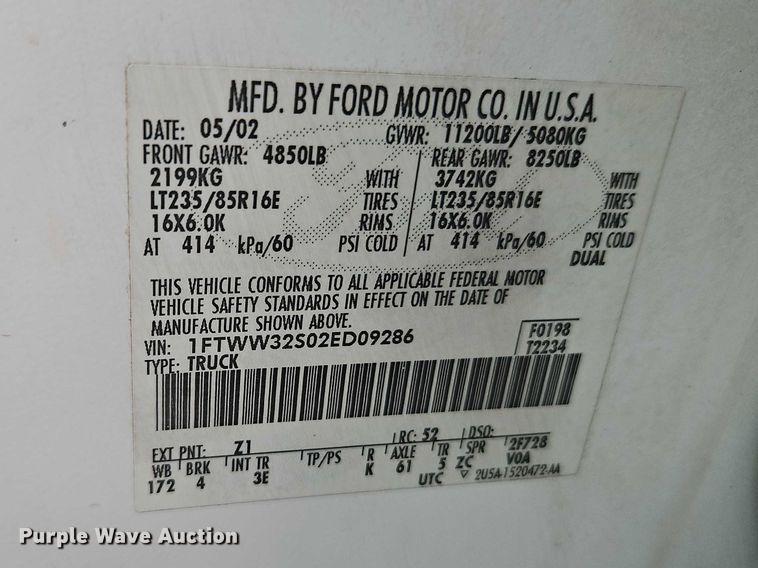 image for item EO7160 2002 Ford F350 Crew Cab utility bed pickup truck