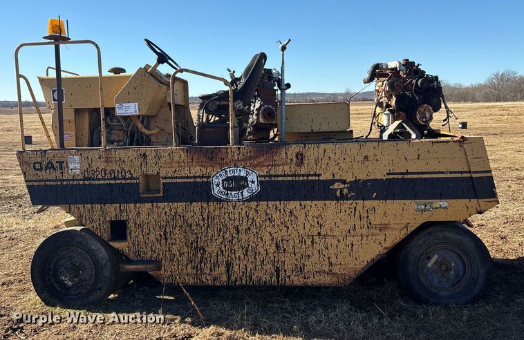 image for item FI0134 1986 Caterpillar PS-130 pneumatic roller