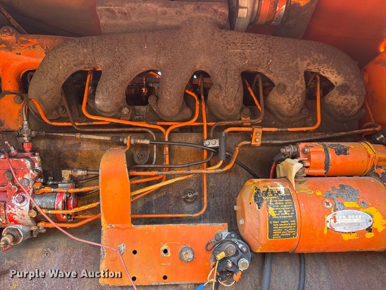 image for item NK9119 1983 John Deere 570A motor grader