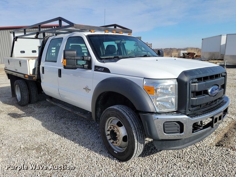 image for item NK9877 2015 Ford F450 Super Duty Crew Cab flatbed truck