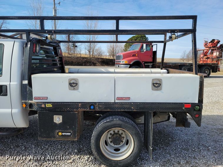 image for item NK9877 2015 Ford F450 Super Duty Crew Cab flatbed truck