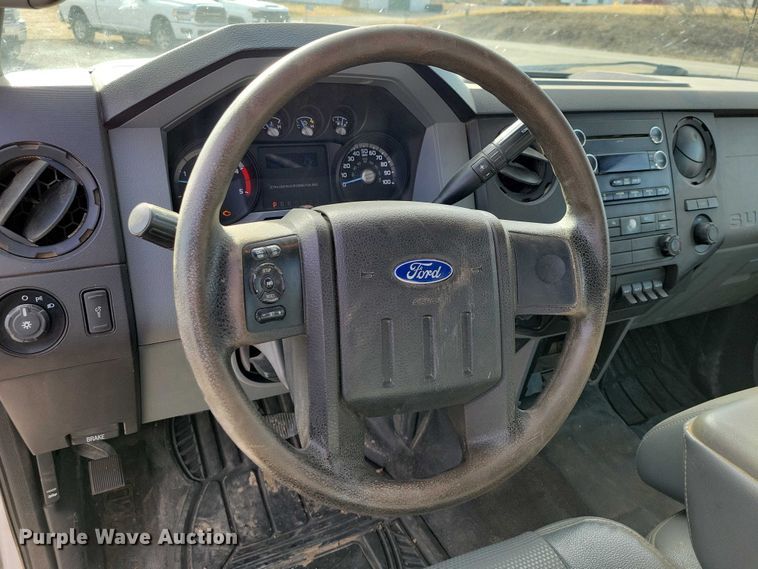 image for item NK9877 2015 Ford F450 Super Duty Crew Cab flatbed truck