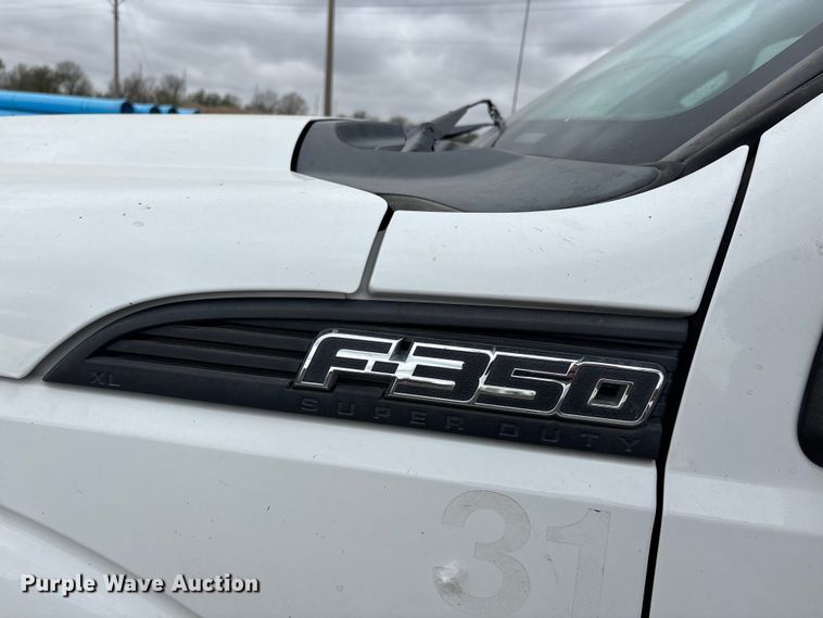 image for item DT0137 2014 Ford F350 Super Duty Ext. Cab utility bed pickup truck