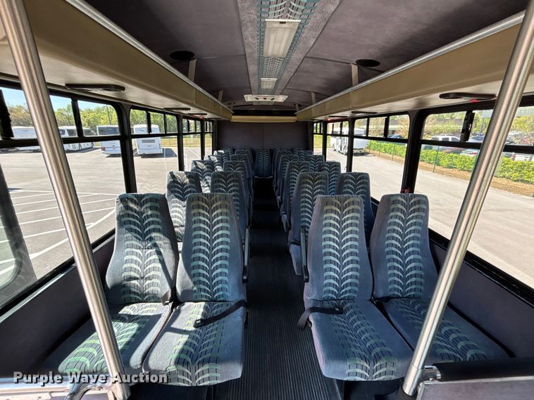 image for item DU0424 2002 Champion Freightliner FB65 shuttle bus