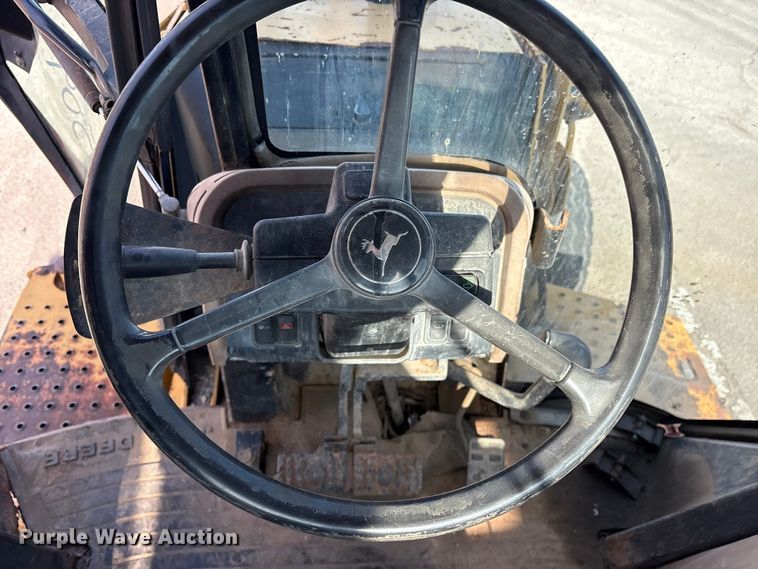 image for item FB8622 1999 John Deere 310SE backhoe