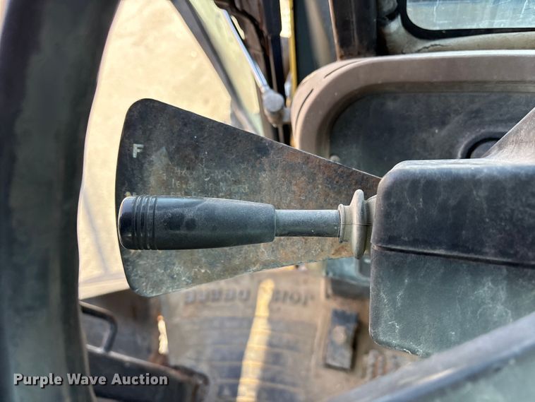 image for item FB8622 1999 John Deere 310SE backhoe