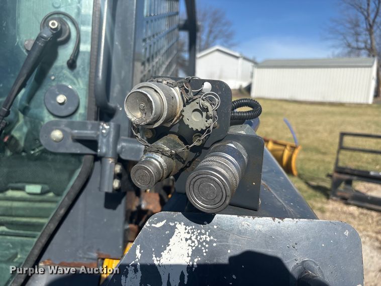 image for item FC4518 2010 John Deere 328D skid steer loader