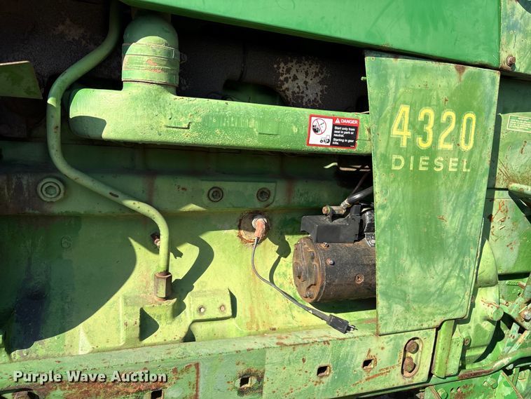 image for item ES8715 John Deere 4320 tractor