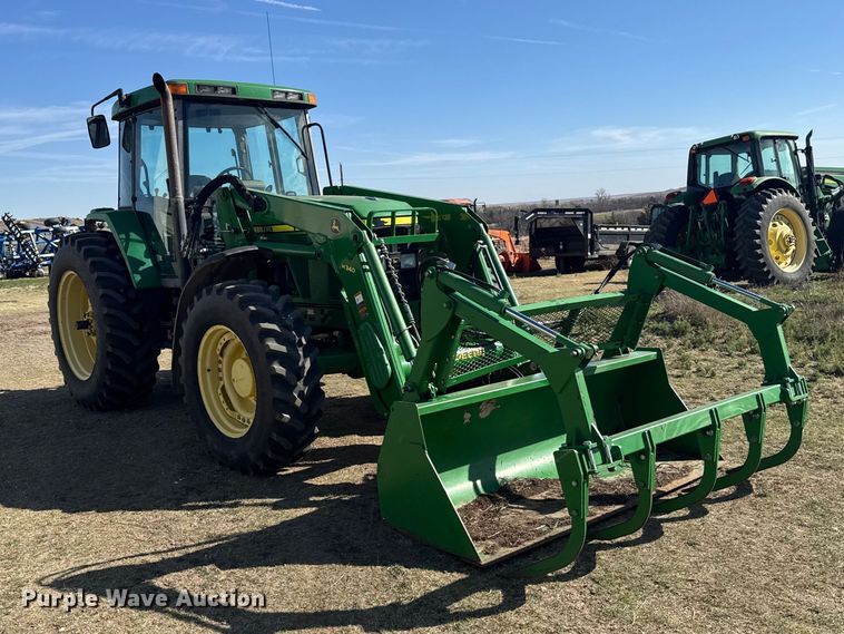 image for item FB7080 2000 John Deere 7210 MFWD tractor