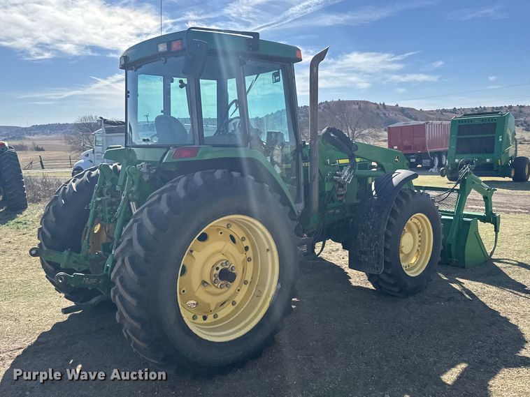 image for item FB7080 2000 John Deere 7210 MFWD tractor