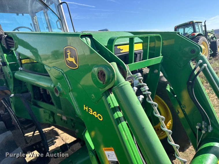 image for item FB7080 2000 John Deere 7210 MFWD tractor