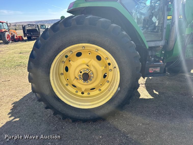 image for item FB7080 2000 John Deere 7210 MFWD tractor