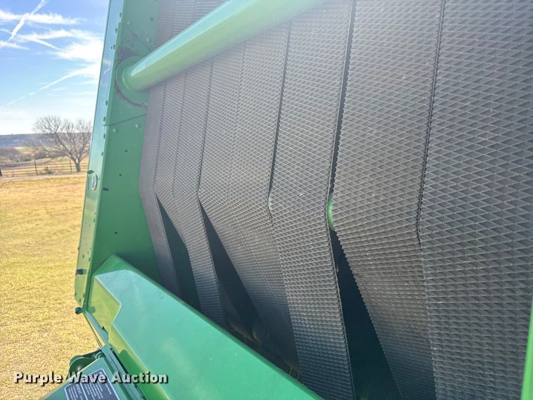 image for item FB7081 2022 John Deere 560M round baler