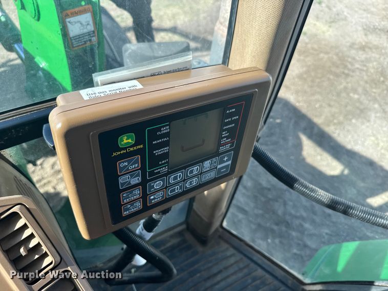 image for item FB7081 2022 John Deere 560M round baler