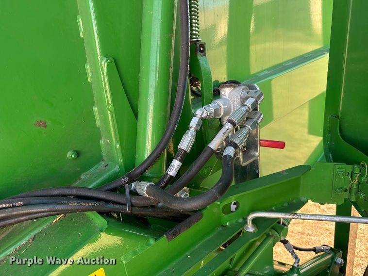 image for item FB7081 2022 John Deere 560M round baler