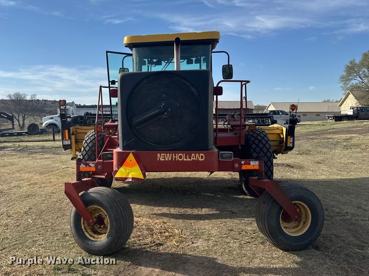 image for item FB7087 2003 New Holland HW320 swather / windrower