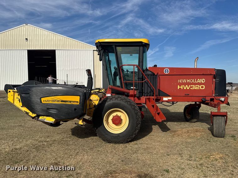 image for item FB7087 2003 New Holland HW320 swather / windrower