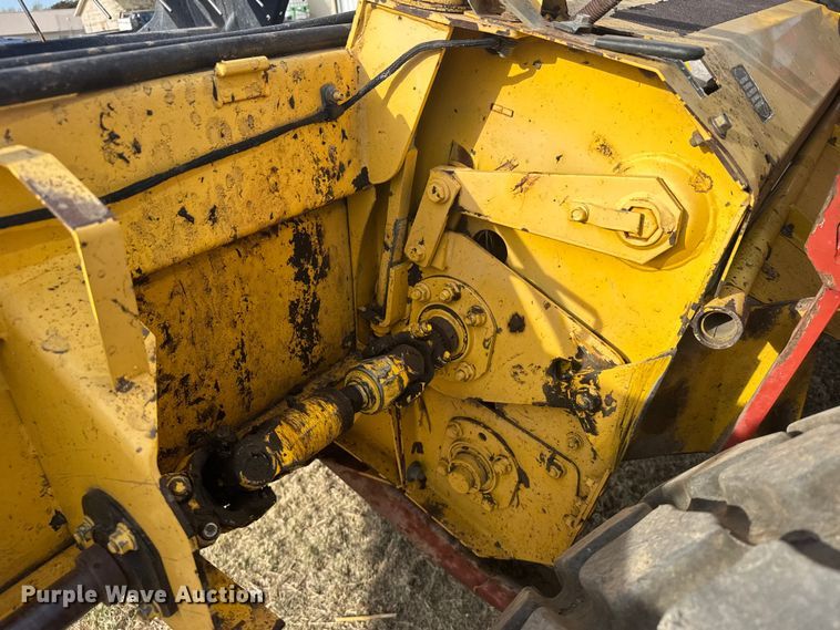 image for item FB7087 2003 New Holland HW320 swather / windrower