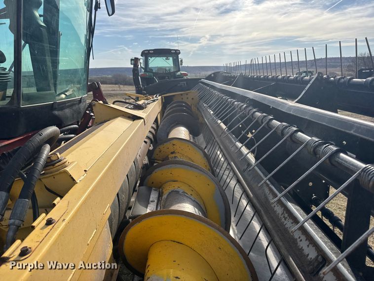 image for item FB7087 2003 New Holland HW320 swather / windrower