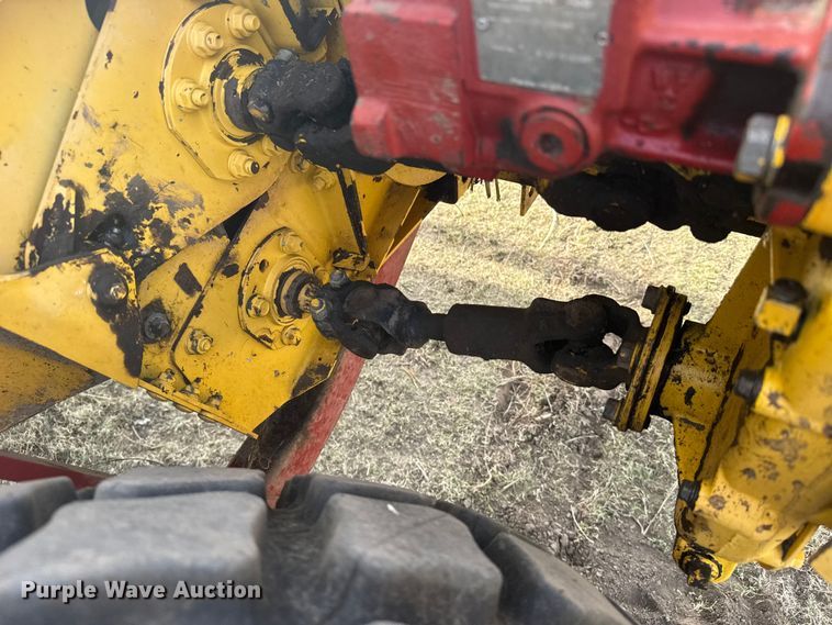 image for item FB7087 2003 New Holland HW320 swather / windrower