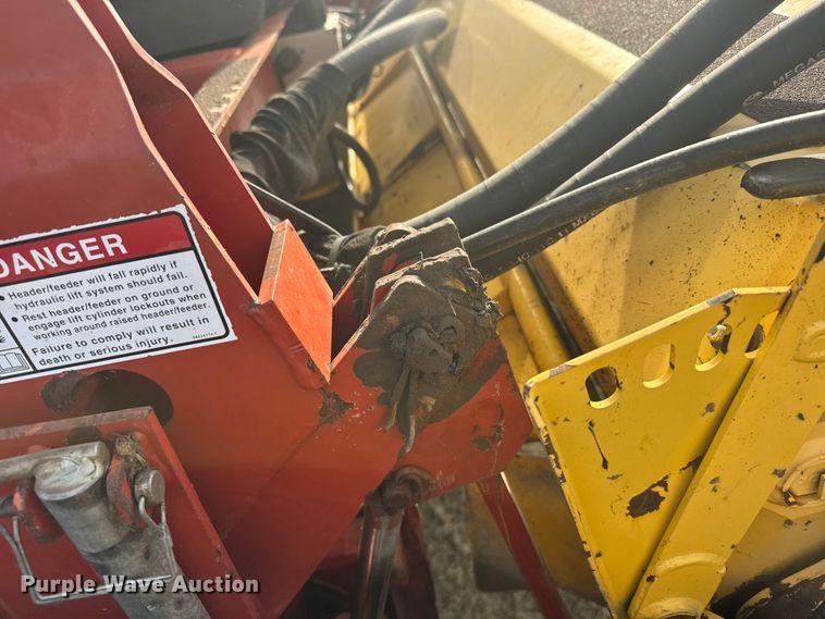image for item FB7087 2003 New Holland HW320 swather / windrower