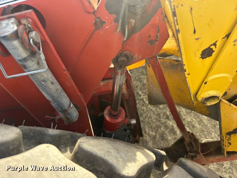 image for item FB7087 2003 New Holland HW320 swather / windrower