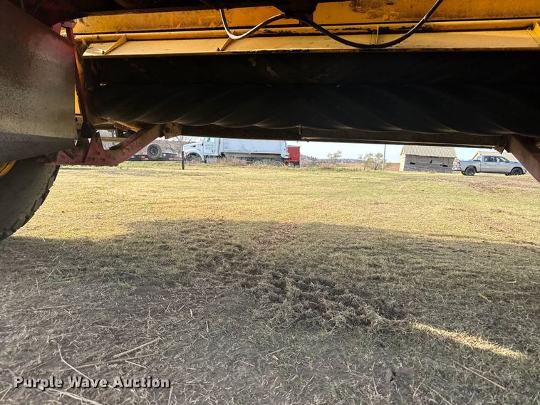 image for item FB7087 2003 New Holland HW320 swather / windrower