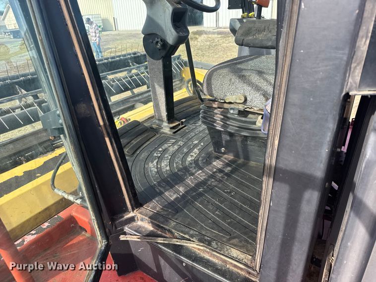 image for item FB7087 2003 New Holland HW320 swather / windrower