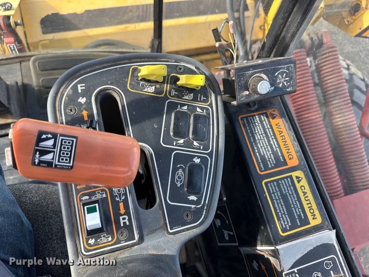 image for item FB7087 2003 New Holland HW320 swather / windrower