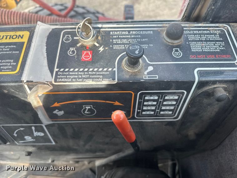 image for item FB7087 2003 New Holland HW320 swather / windrower