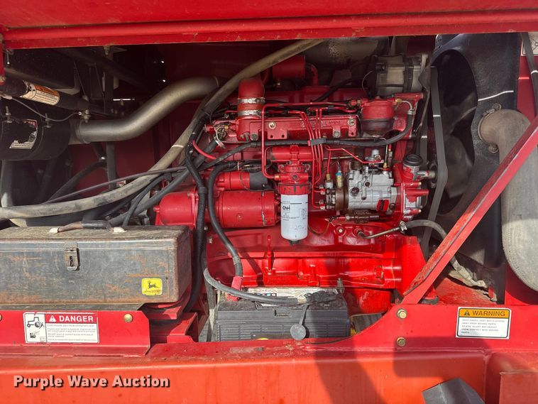 image for item FB7087 2003 New Holland HW320 swather / windrower