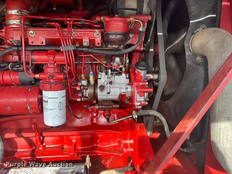 image for item FB7087 2003 New Holland HW320 swather / windrower