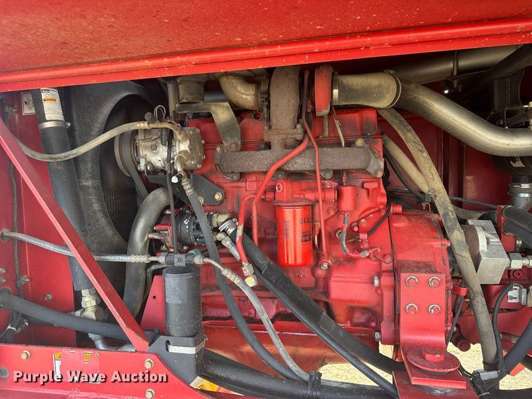 image for item FB7087 2003 New Holland HW320 swather / windrower