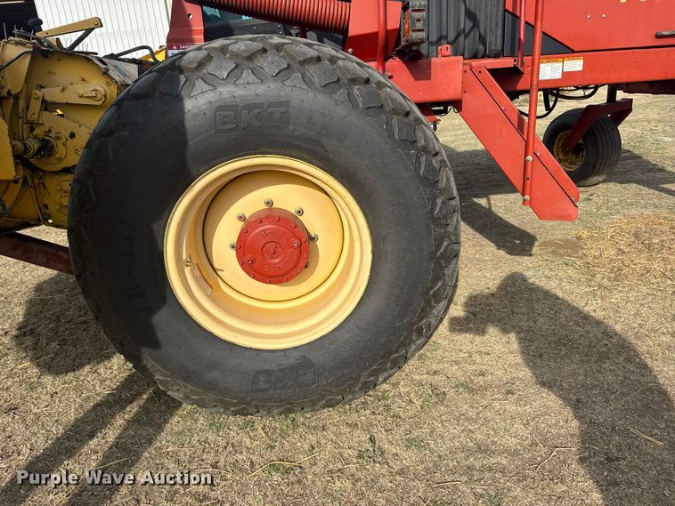 image for item FB7087 2003 New Holland HW320 swather / windrower