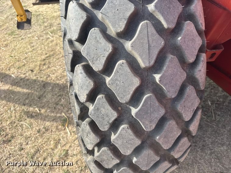 image for item FB7087 2003 New Holland HW320 swather / windrower