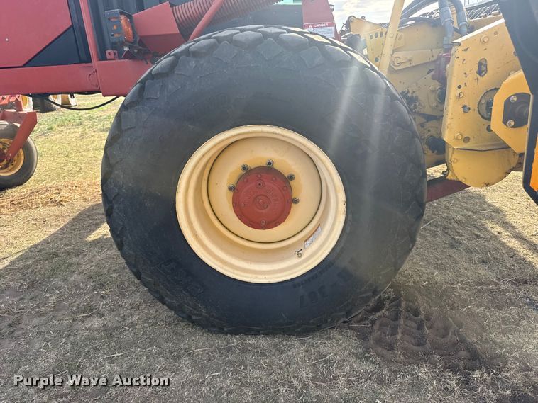 image for item FB7087 2003 New Holland HW320 swather / windrower