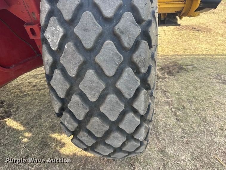 image for item FB7087 2003 New Holland HW320 swather / windrower