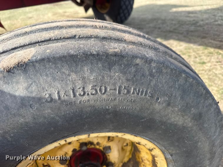 image for item FB7087 2003 New Holland HW320 swather / windrower