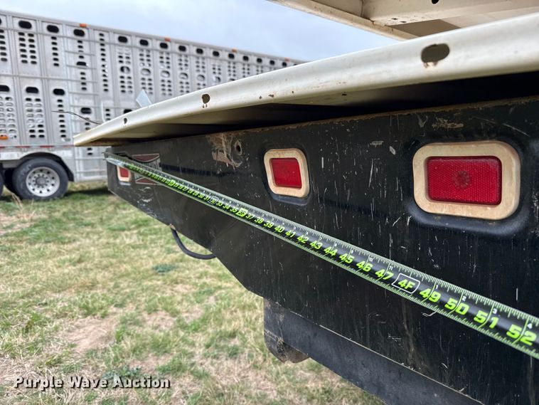 image for item NK9124 2001 Ford F750 Super Duty dump flatbed truck