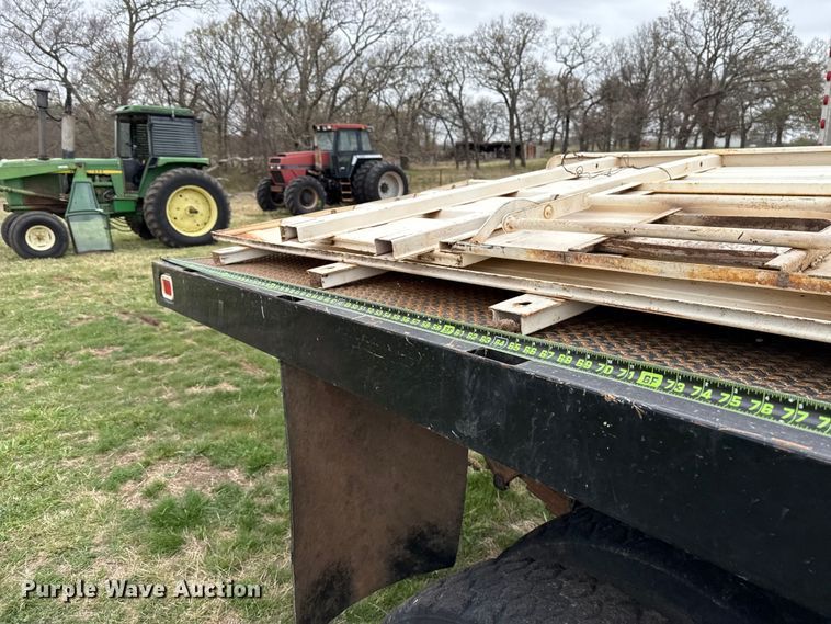 image for item NK9124 2001 Ford F750 Super Duty dump flatbed truck