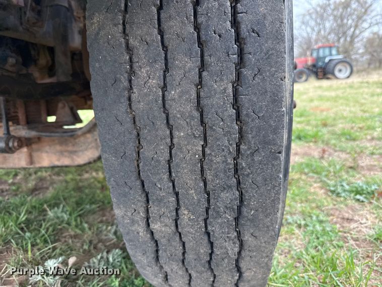 image for item NK9124 2001 Ford F750 Super Duty dump flatbed truck