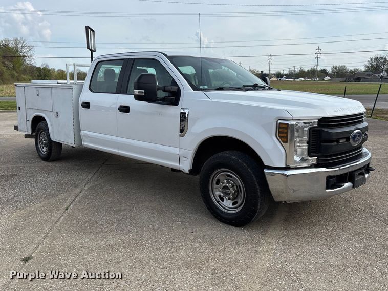 image for item DT0129 2019 Ford F250 Super Duty Crew Cab utility bed pickup truck